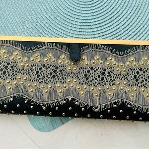 Betsey Johnson Black and Gold Lace Clutch